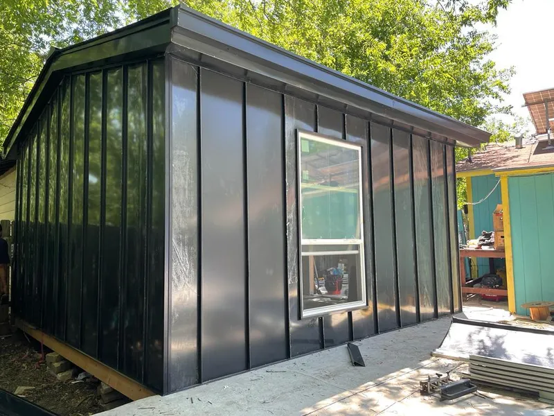 Black standing seam metal wall panels for Roof Inspection in Altadena