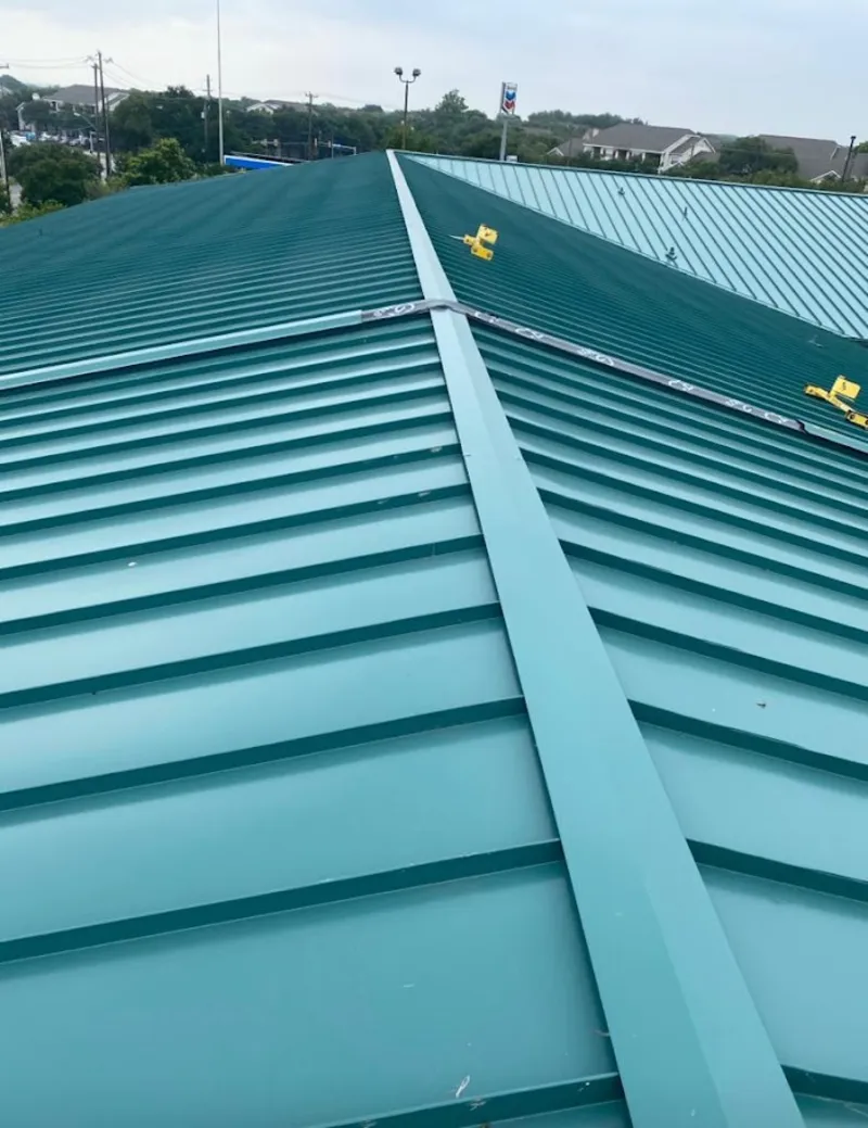 Green commercial metal roof ridge and valley for Metal Roof Repair in Altadena